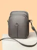 Elegante bolso pequeño cuadrado de piel suave para teléfono para mujer, nuevo modelo 2026, bolso de hombro cruzado versátil simple de nicho, monedero