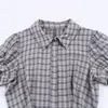 Atacado de Vestido Curto Feminino Transfronteiriço Europeu e Americano, Nova Decoração Xadrez, Vestido em Camadas com Design Estiloso e Moderno