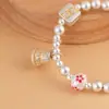 Pulsera de Tobillo Rey Ciervo Dorado Plata Moda Artística Jiyan Nafu Rastreo Peso de Oro Lingote de Plata Perla Redonda Estampada Envoltura para Mujer