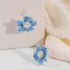 Pendientes de Flor con Esmalte de Goteo Azul, Pinzas para Orejas de Disco Espiral, Nuevo Estilo Caliente 2025, Únicos Elegantes, Pendientes y Aretes Exquisitos