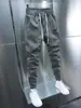 Pantalones casuales para hombre estilo coreano ajustados elásticos cónicos tipo harén Primavera y Otoño nueva marca de moda pantalones deportivos cortos moda masculina
