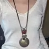 Colar de Metal Retro Laço Antigo Estilo Étnico Boêmio Simples Versátil Longo Pingente de Argola 2025