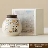 Fabricante Shishi Ruyi Lata de Té de Panda Almacén de Té de Cerámica Lata Pequeña Portátil para Almacenamiento de Té Lata Sellada Lata Individual