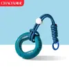 Chaveiro de anel de aperto criativo transfronteiriço para alívio de estresse, mini treinador de dedos colorido, dispositivo de aperto para alívio de estresse, pingente de mochila