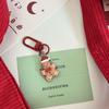 Novo chaveiro de Natal para meninas, bolsa de estudante, pingente, conjunto de fones de ouvido de cura fofos, presentes pendurados para namoradas