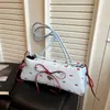 Bolso de Axila con Lunares y Lazo Estilo Dulce Coreano para Mujer Moda Verano 2026 Bolso de Mano Sencillo Bolso Versátil