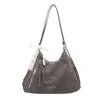 Bolso casual retro de nicho para mujer, nuevo bolso de hombro de gran capacidad de moda para el otoño de 2026, bolso cruzado