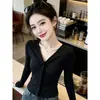 OEM2026 Otoño Nuevo Estilo Coreano Moda Diseño Elegante Corte Ajustado Cuello en V Torcido Manga Larga Suéter de Punto