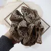 Goma para el pelo de leopardo de alta gama para mujer, nuevo estilo 2025, coleta alta, accesorio para el pelo, círculo