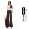 2026 Otoño Temprano Nuevo Diseño Caqui Sentido Botón de Remache Doble Botonadura Versátil Adelgazante Pierna Recta Micro Campana Jeans para Mujer