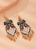 Cinco características, ojos, aretes, explosiones amazónicas, aretes de borla larga caliente transfronterizos europeos y americanos, aretes bohemios