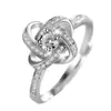 Anillo de amor giratorio índice dedo simple moda anillo personalidad diamante hierba de la suerte anillo abierto joyería de plata al por mayor