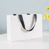 Bolsa de Regalo de Mano Incrustada Bolsa de Papel Universal Color Puro Tarjeta Blanca Estampado en Caliente Logo Ropa Té Bolsa de Papel de Regalo Empaque