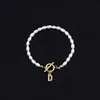 Pulsera de Moda de Venta Caliente Transfronteriza 2026 con Diamantes y 26 Letras, Pulsera de Perlas de Imitación Ovaladas, Disponible para Venta al por Mayor para Mujeres