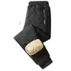 Pantalones térmicos gruesos para hombre, de corte holgado y forro polar para actividades al aire libre, con forro de lana de cordero para abrigar y resistir el frío, adecuados para hombres jóvenes y uso casual.