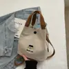 Bolsa Pequena Transversal de Celular de Luxo Nicho Primavera e Verão para Mulheres 2026 Nova Bolsa Saco Off-White Bolsa de Mão Super Popular