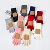 Guantes antideslizantes con etiqueta de cuero, lana tejida de color sólido, para pantalla táctil, cálidos, con rayas verticales, guantes de invierno de alta gama para hombres y mujeres, al por mayor