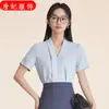 Camisa Blanca de Manga Corta para Mujer Verano 2025 Nueva Sentido de Alta Gama Elegante Pequeña Moda Camisa de Viaje Vestido