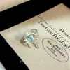 Anillo de Lazo de Metal Cepillado Mate Nuevo Coreano Nicho Lujo Ligero Gama Alta Anillo de Estrella de Cuatro Puntas