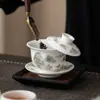 Porcelana de jade de lana de cordero con detalles dorados, taza de té colgante estilo Jiangshan, juego de tres piezas para uso doméstico, juego de té estilo chino para preparar té, taza de té no caliente