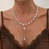 Collares de perlas cruzados europeos y americanos, cadenas para la clavícula minimalistas y de moda, simples y elegantes, accesorios versátiles, al por mayor