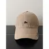 Gorra de béisbol bordada con letras de marca coreana de nicho de moda 2026 para mujer, estilo callejero versátil, gorra de béisbol adelgazante para hombre