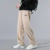 Calça de veludo cotelê masculina 2026 nova moda primavera e outono calça casual de perna larga da moda calças masculinas calças esportivas masculinas larga
