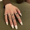 Nuevo anillo de cadena de moda europea y americana para mujer, estilo retro, apertura sencilla, joyería para parejas de estudiantes, joyería creativa con pegamento en forma de gota.