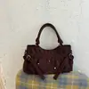 Bolso de mano de gamuza de alta calidad, estilo vintage para mujer, nueva colección 2026, bolso bandolera de un solo hombro, diseño único, bolso versátil para debajo del brazo