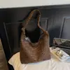 Bolso tejido de axila estilo Maillard retro para mujer, nuevo modelo 2026, bolso de hombro y cruzado para el día a día, bolso de moda versátil
