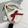 Bolso de Peluche con Lazo 2026 Otoño Nuevo Tendencia Personalidad Moda Bolso de Hombro Cruzado Bolso Cubo para el Trabajo y el Viaje