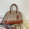 Bolso de Mano con Forma de Concha Vintage 2026 Nueva Moda Versátil Hombro Cruzado Marca de Nicho Monograma Alto Gama Transfronterizo