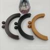 Venta al por mayor de fábrica accesorios para bolsos semicírculo asa de madera marco de madera boca oro madera maciza marco con clip para bolso asa de madera
