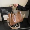 Bolso tipo cubo de gran capacidad para mujer 2023, nuevo, para ir al trabajo, moda nicho, combina con todo, simple, europeo y americano, de hombro, cruzado, tipo tote