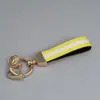 Llavero de Cinta de Nailon Tricolor de Venta Caliente Transfronteriza Llavero de Cuero Colgante Coche Coche Tira de Color Lanyard para Llaves