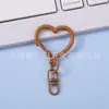 Llavero con Figura de Corazón de Melocotón Pintado de Colores Forma de Ocho Accesorios Hebilla de Aleación Joyería para Llavero Hebilla Venta al por Mayor