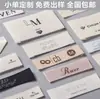 Etiquetas Tejidas Personalizadas, Etiquetas de Lavado para Ropa, Etiquetas de Talla Universal, Etiquetas Personalizadas para Cuello de Pequeñas Órdenes Directas de Fábrica