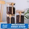 Cuchara de Madera de Bambú al por Mayor Tarro de Vidrio Cuadrado Sellado Cocina Tapa de Bambú Botella para Condimentos Vidrio de Borosilicato Alto Tarro para Almacenamiento de Granos de Café