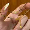 Pulsera Popular Antigua de Cruz Negra y Dorada Nueva Lujo Ligero Moda Nicho Joyería Tejida de Gama Alta