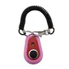 Tume Nuevos Suministros de Entrenamiento para Mascotas Clicker de Entrenamiento Ovalado de Dos Colores Entrenador Portátil Venta al por Mayor Banda Negra para la Muñeca