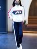 Traje de moda casual para mujer Primavera y Otoño 2023 nuevo polo de tenis suéter con cremallera pantalones con tobillo atado traje de dos piezas moda