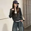 Suéter de punto con capucha a rayas estilo retro para mujer, nueva colección otoño/invierno 2026, top casual estilo coreano versátil y favorecedor