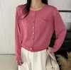 Cárdigan de punto abotonado colorido estilo europeo para mujer, nuevo modelo de otoño 2026, bolsillo pequeño único, suave y holgado, abrigo suéter que reduce la edad
