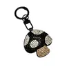 Chaveiro criativo em formato de cogumelo, transfronteiriço, leve e luxuoso, com adornos de diamante, material de PU moderno, charmoso de bolsa requintado estilo coreano e japonês, e um acessório fofo para meninas