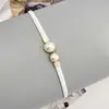 Design de nicho senso de alta qualidade couro envernizado pérola cinto fino feminino decorativo versátil vestido terno cintura cinto feminino