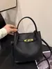 Super Caliente Esenciales para el Trayecto Bolso Tote Pequeño para Mujer 2026 Nuevo Verano Textura de Lichi Bolso Cubo de Hombro Cruzado para Viajero