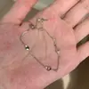 Pulseira de chave em formato de coração, estilo vintage novo único, luxo leve, design de nicho requintado, pulseira de casal de alta qualidade