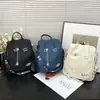 Mochila para Mulheres 2026 Novo Estilo Casual Viagem Antifurto Leve Nylon Versátil Estudante Bolsa Escolar