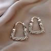 Aretes dorados rotos con costuras plateadas en forma de U para mujer, diseño de nicho exagerado, ins de alta gama, lujo ligero, aretes personalizados, aretes, aretes