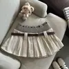 Xiaoxiangfeng 2025 Nuevo Estilo Otoño Maillard Sexy Punto Tejido con Cordón Falda Corta de Pana Falda Plisada